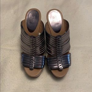 Coach metallic platform wedge sandals.